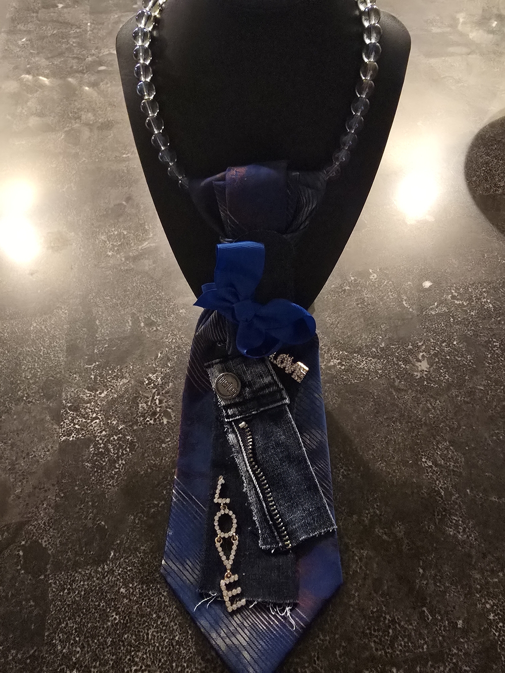 Handcrafted Blue Statement Necktie w/denim pieces.